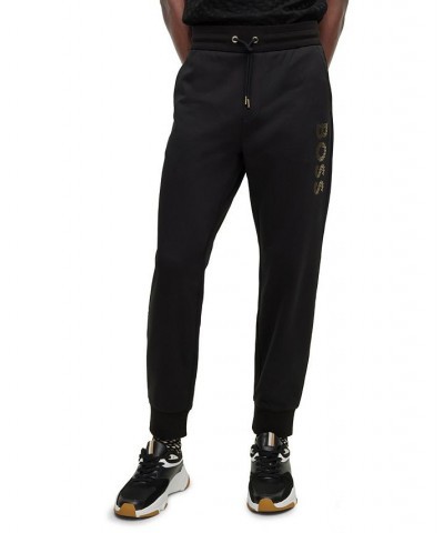 BOSS Men's Monogram-Filled Logo Tracksuit Bottoms Black $73.78 Pants