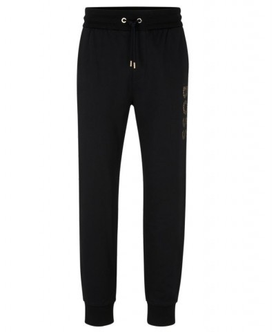 BOSS Men's Monogram-Filled Logo Tracksuit Bottoms Black $73.78 Pants